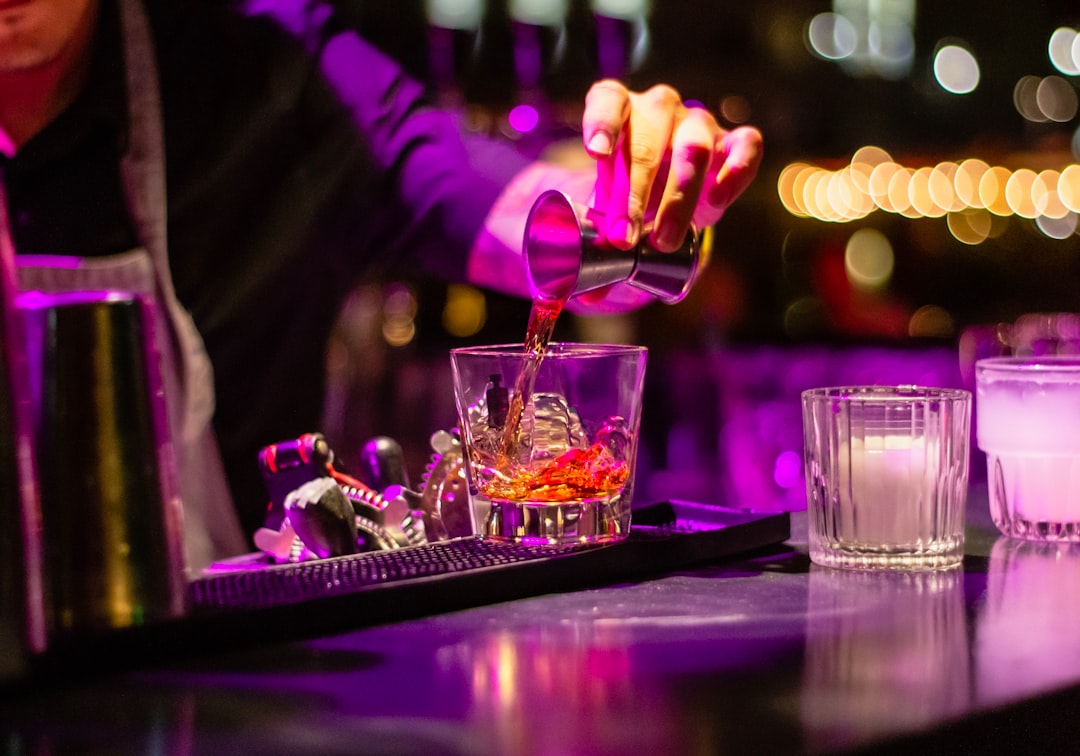 Cocktail being prepared at a bar